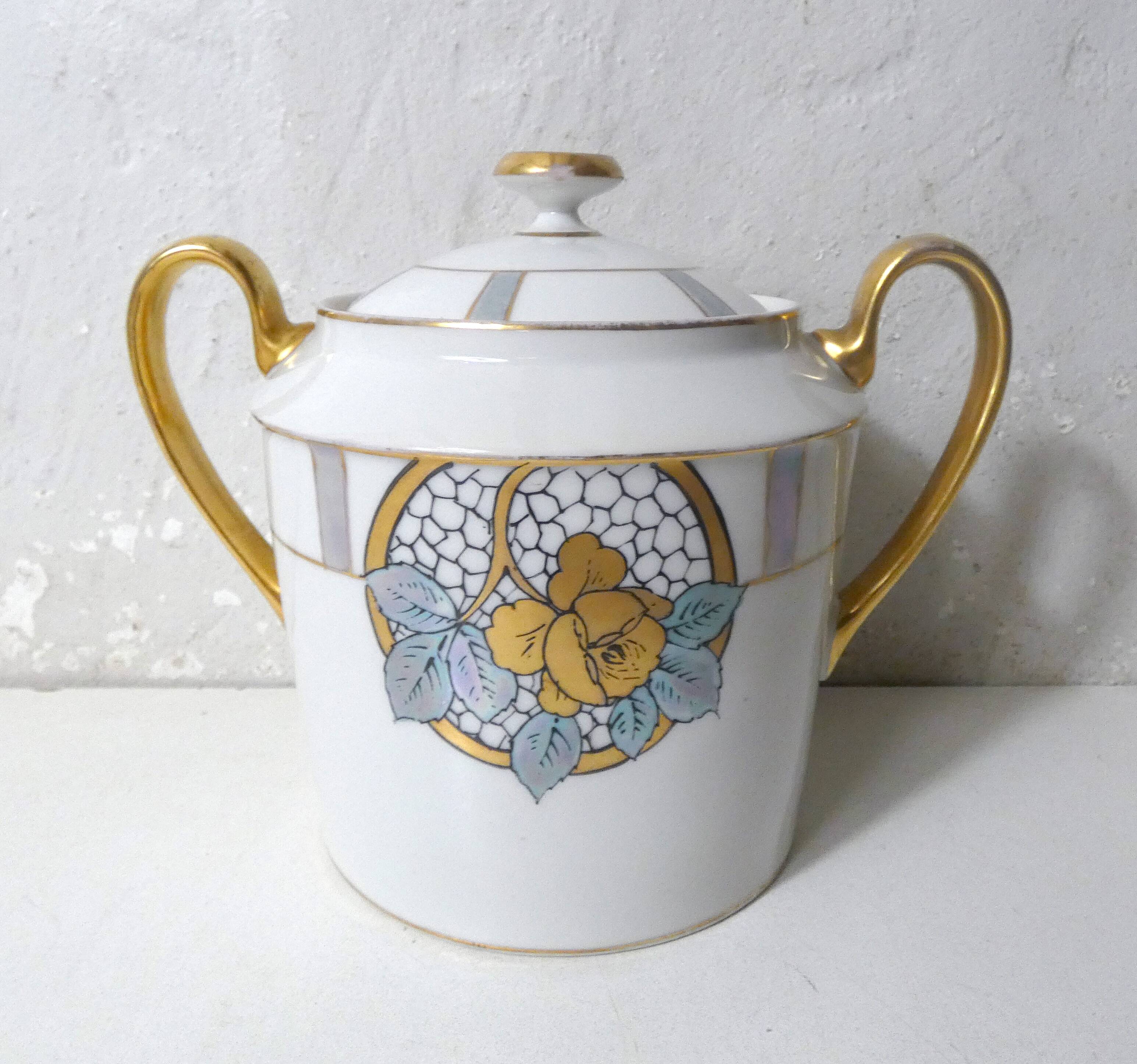 Limoges Ribes porcelain tea and coffee service, gold, silver, iridescent mother-of-pearl, Art Deco