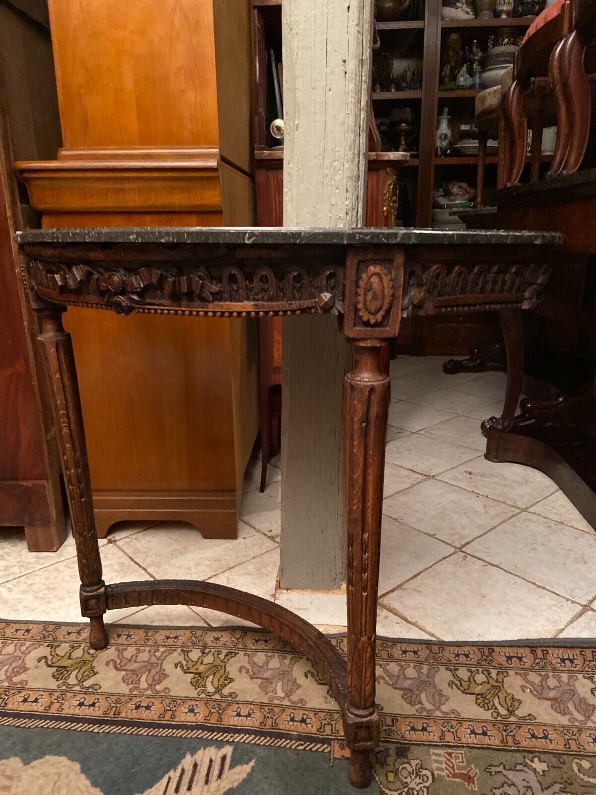 Half-moon console eighteenth century solid oak with carved decoration Louis XVI era