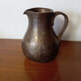 Ancienne cruche en bronze