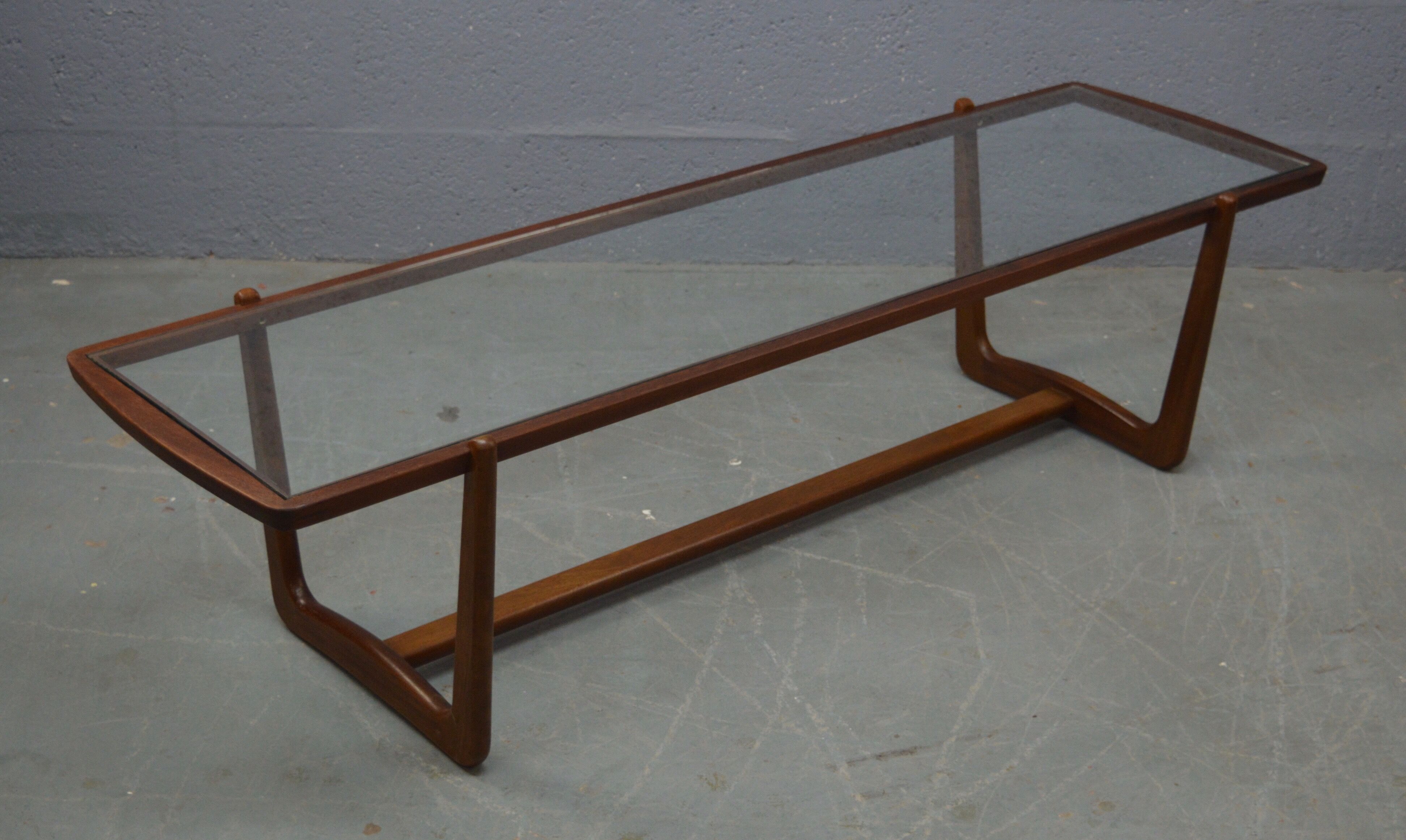 Mid century glass topped coffee table