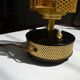 Perforated metal lamp with a 50s-style TV