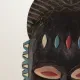 Masque mural en bois sculpté et peint