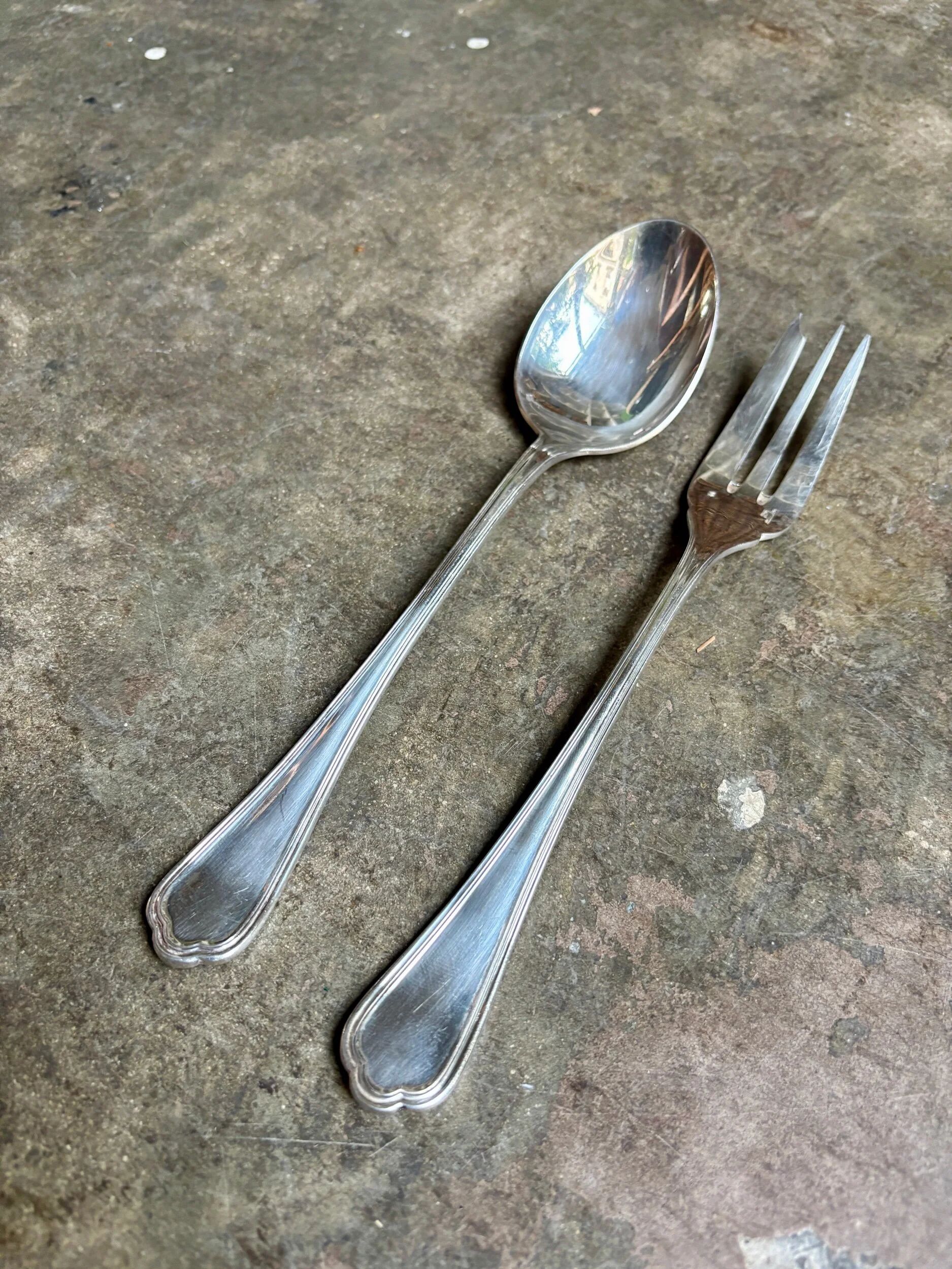 2 Christofle silver-plated serving cutlery, "Spatours" pattern.