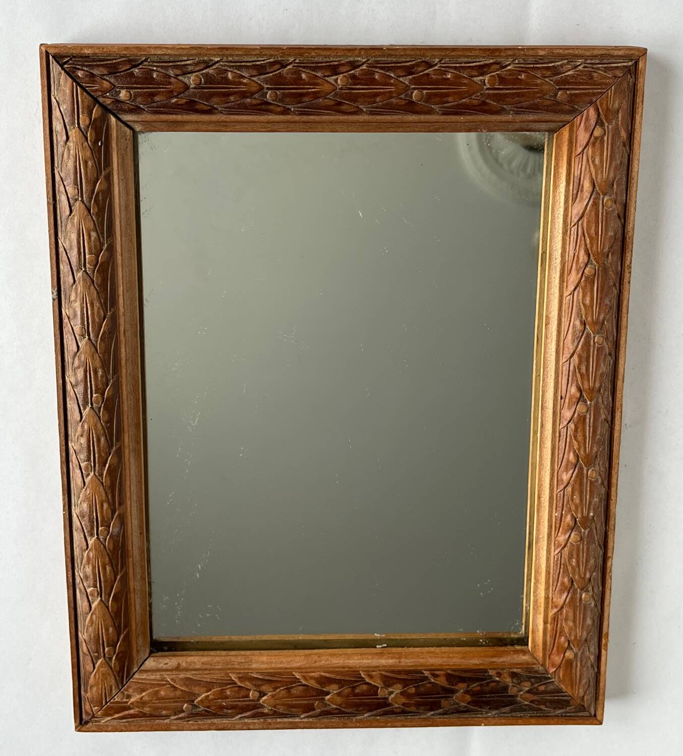 Antique carved wooden mirror