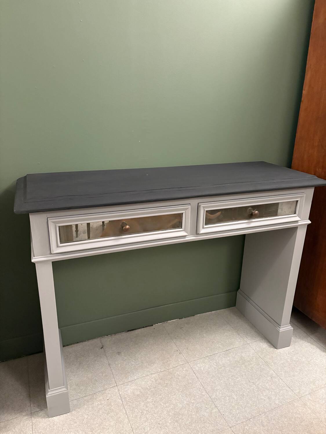 Superb matte black console with a natural top.