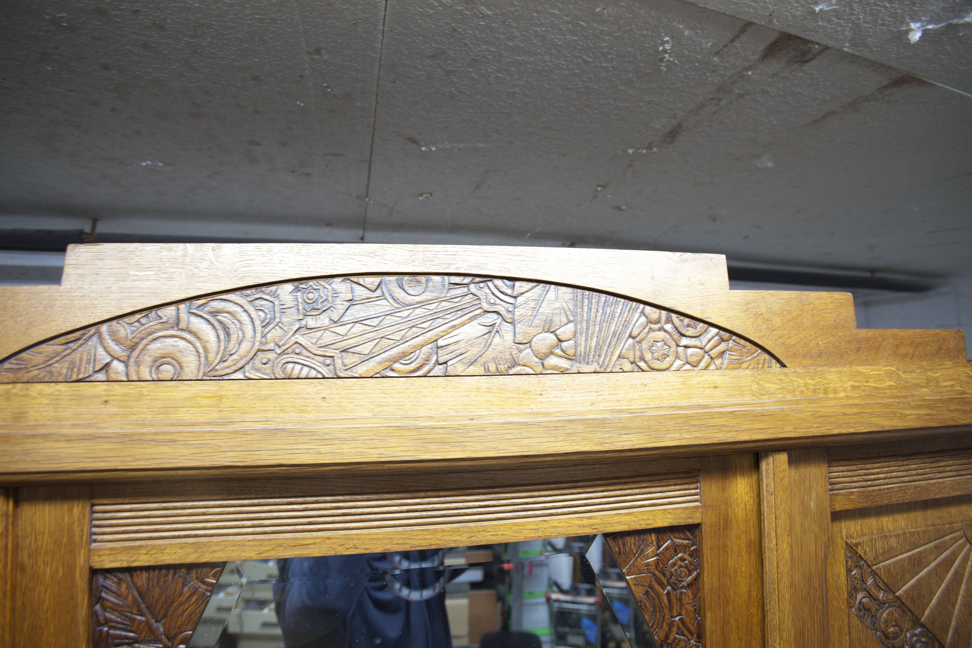 Art Deco carved oak wardrobe - Flemish workshop circa 1930