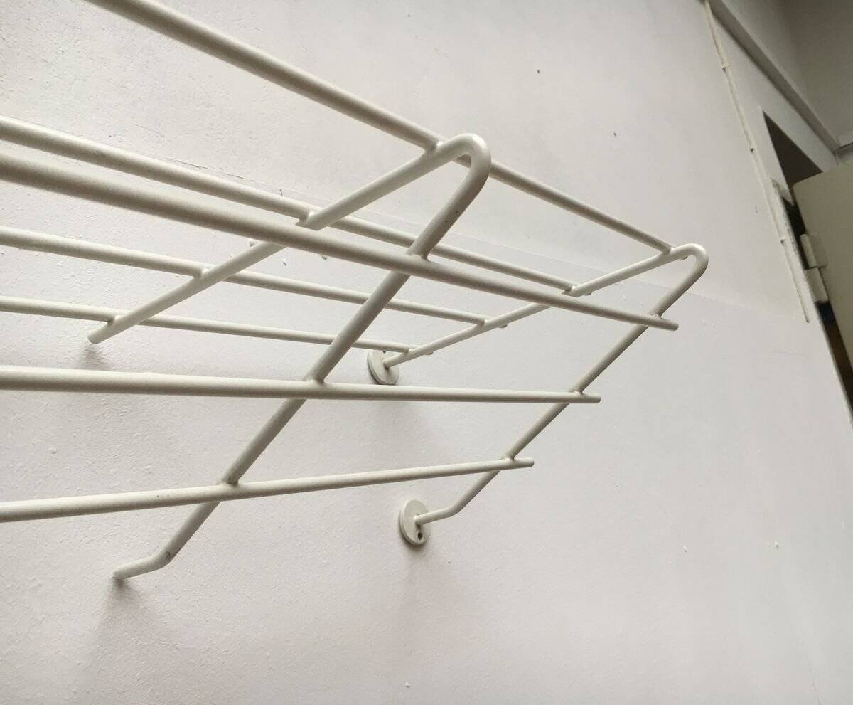 Mid-century modern minimalist metal coat rack from the 1960s.
