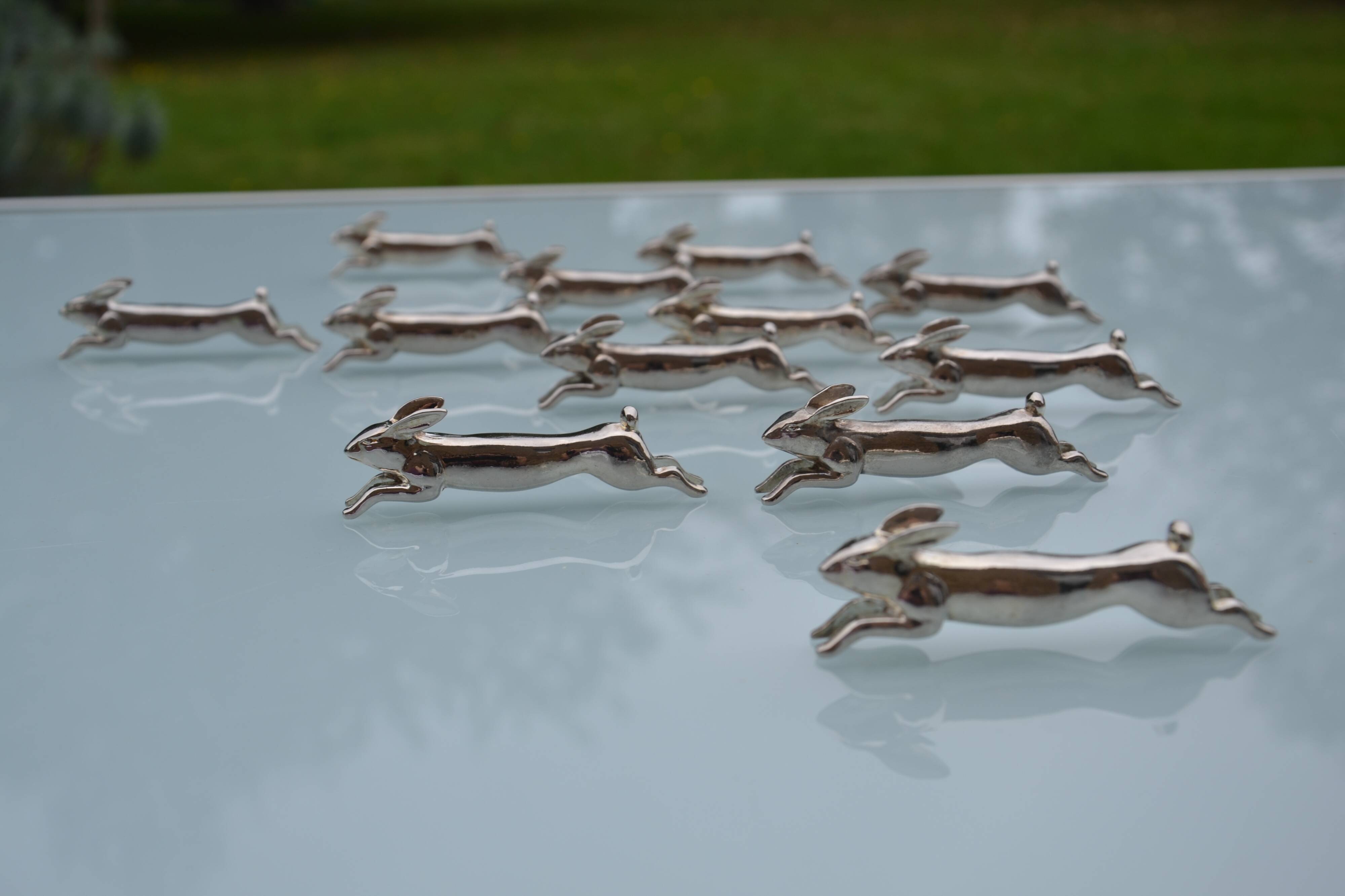 12 silver-plated metal "rabbit" knife rests
