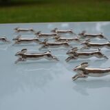 12 silver-plated metal "rabbit" knife rests