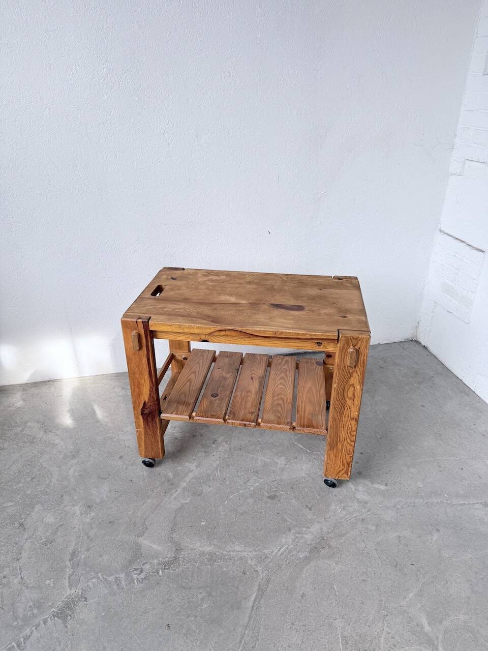 1980 pine wheeled console table