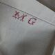 Set de 6 serviettes en lin caviar 1930 brodées MG rouge 65 x 85