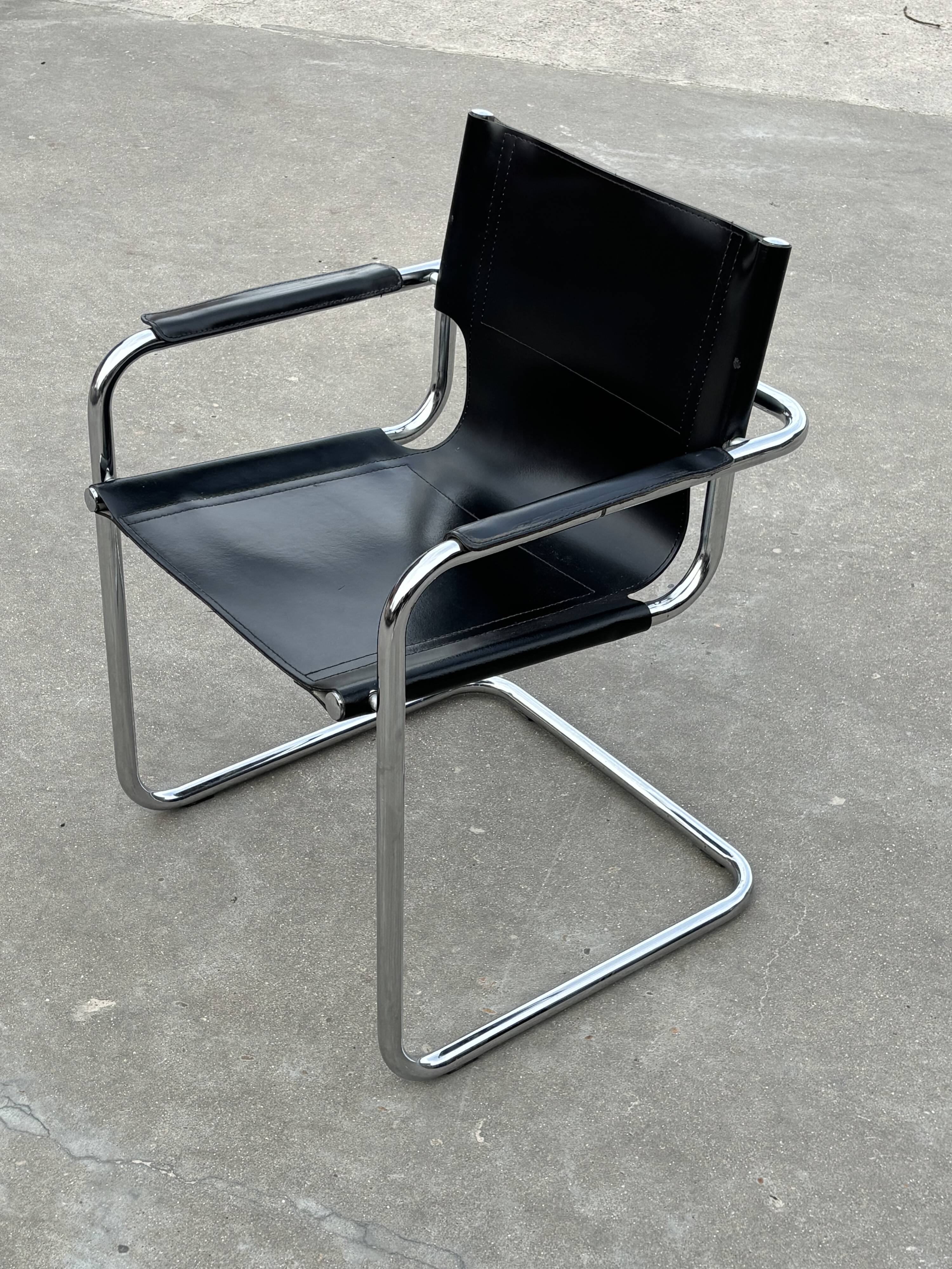 Set of 4 design cantilever chairs black and chrome design made in Italy