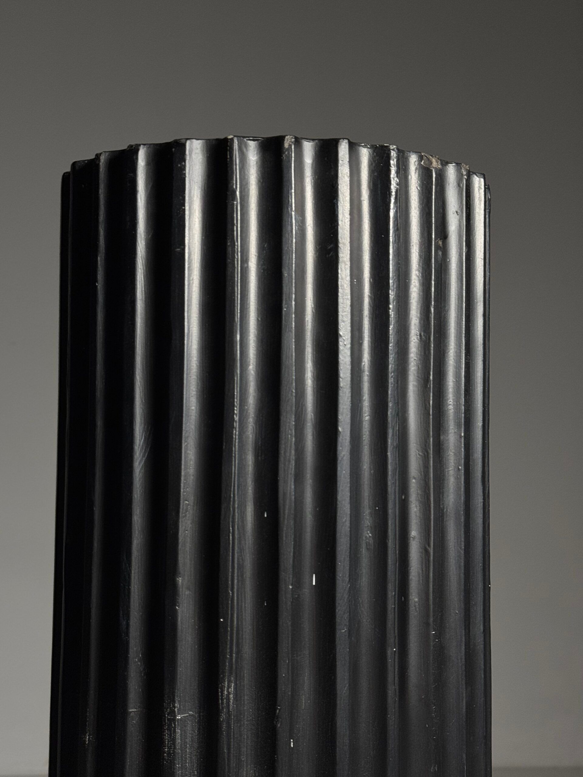 Neoclassical black plaster column