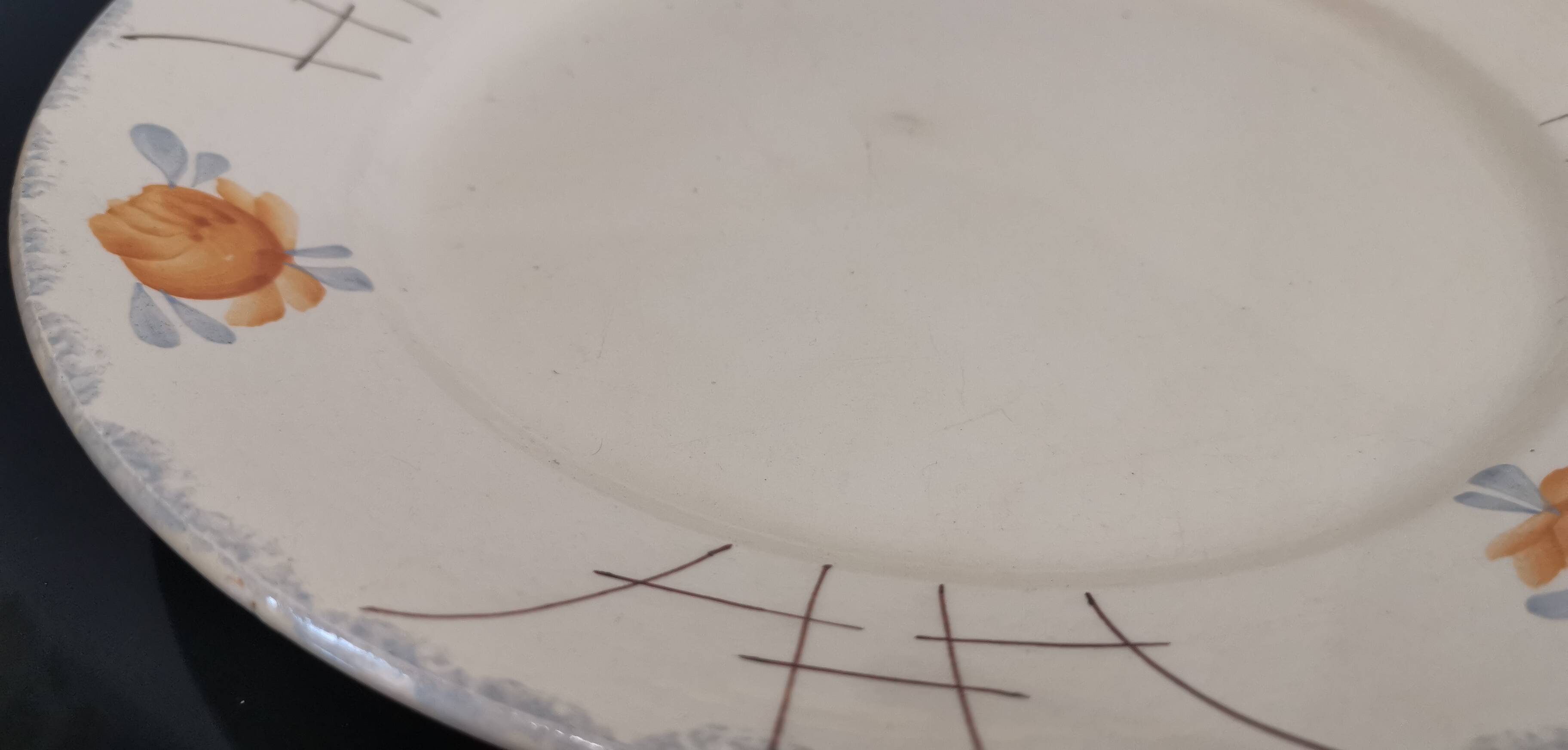 Old Terre de fer earthenware dish, hand painted