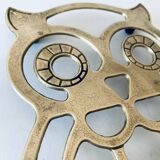 Vintage brass trivet in the shape of an owl