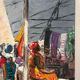 Market in Dakar, oil on panel signed G Vignesoult.
