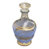 Blue granite glass carafe with vintage gold trim.