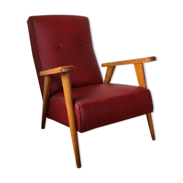 Vintage armchair with compass legs in red faux leather.