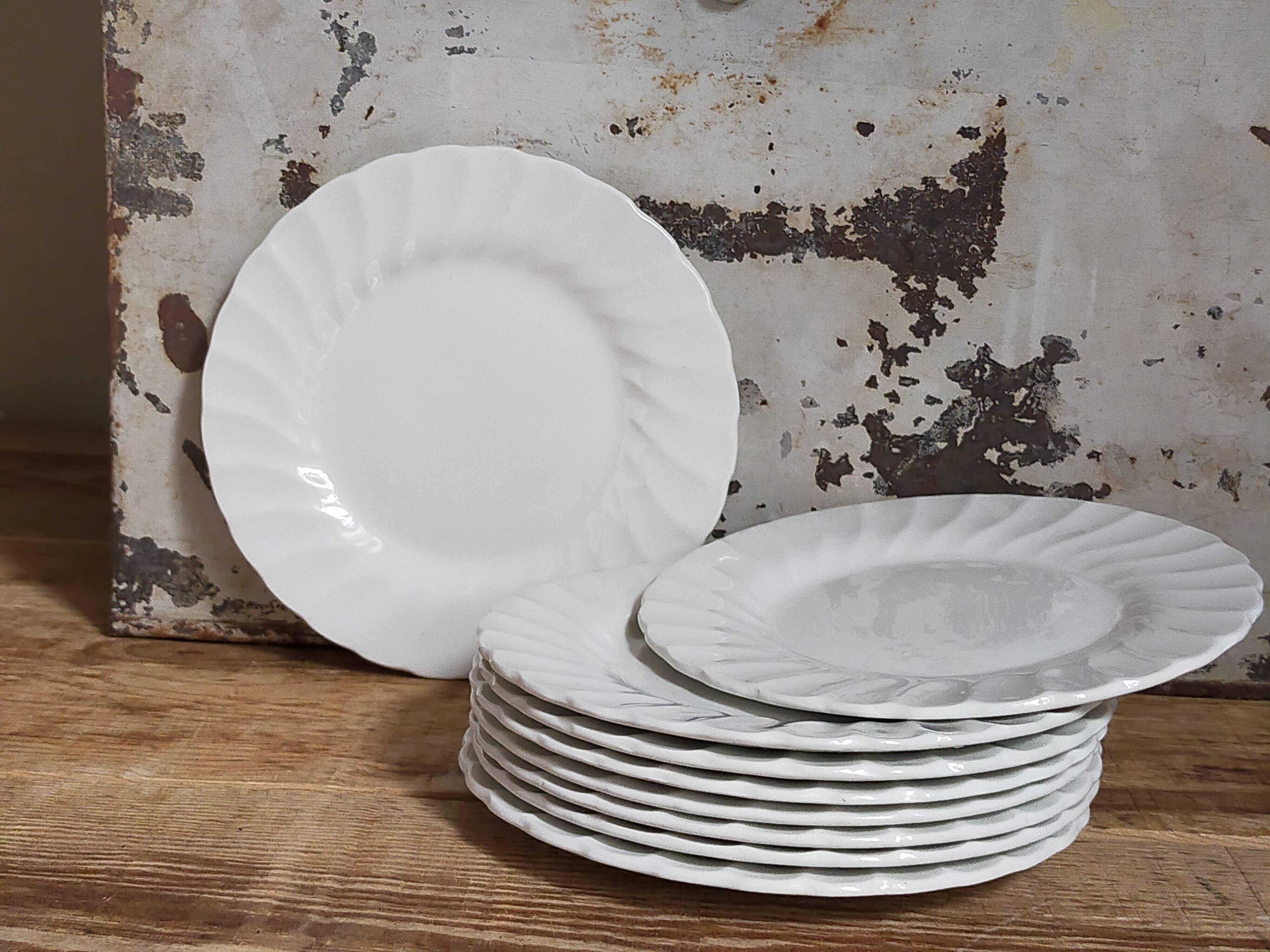 Nine fine English porcelain sweet plates