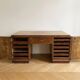 Large Art Deco desk in solid wood with storage cabinets.