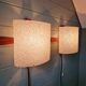 Pair of Scandinavian wall sconces in teak and plastic resin, 1960.