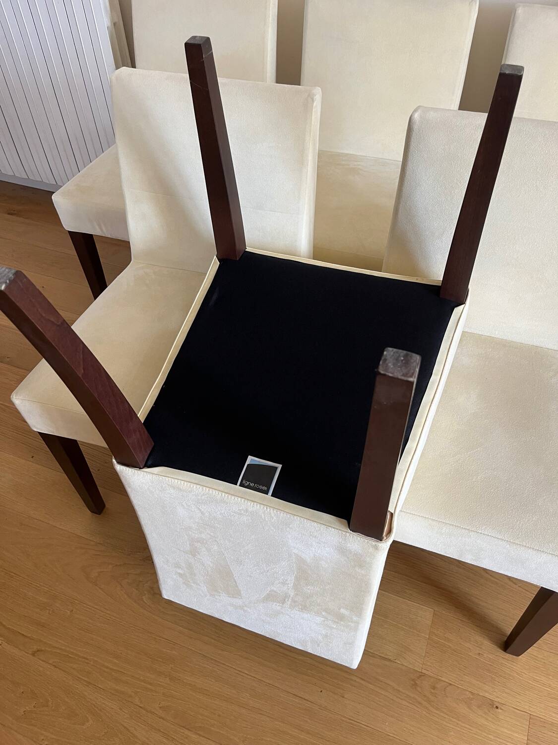 6 Ligne Roset chairs in ivory alcantara.
