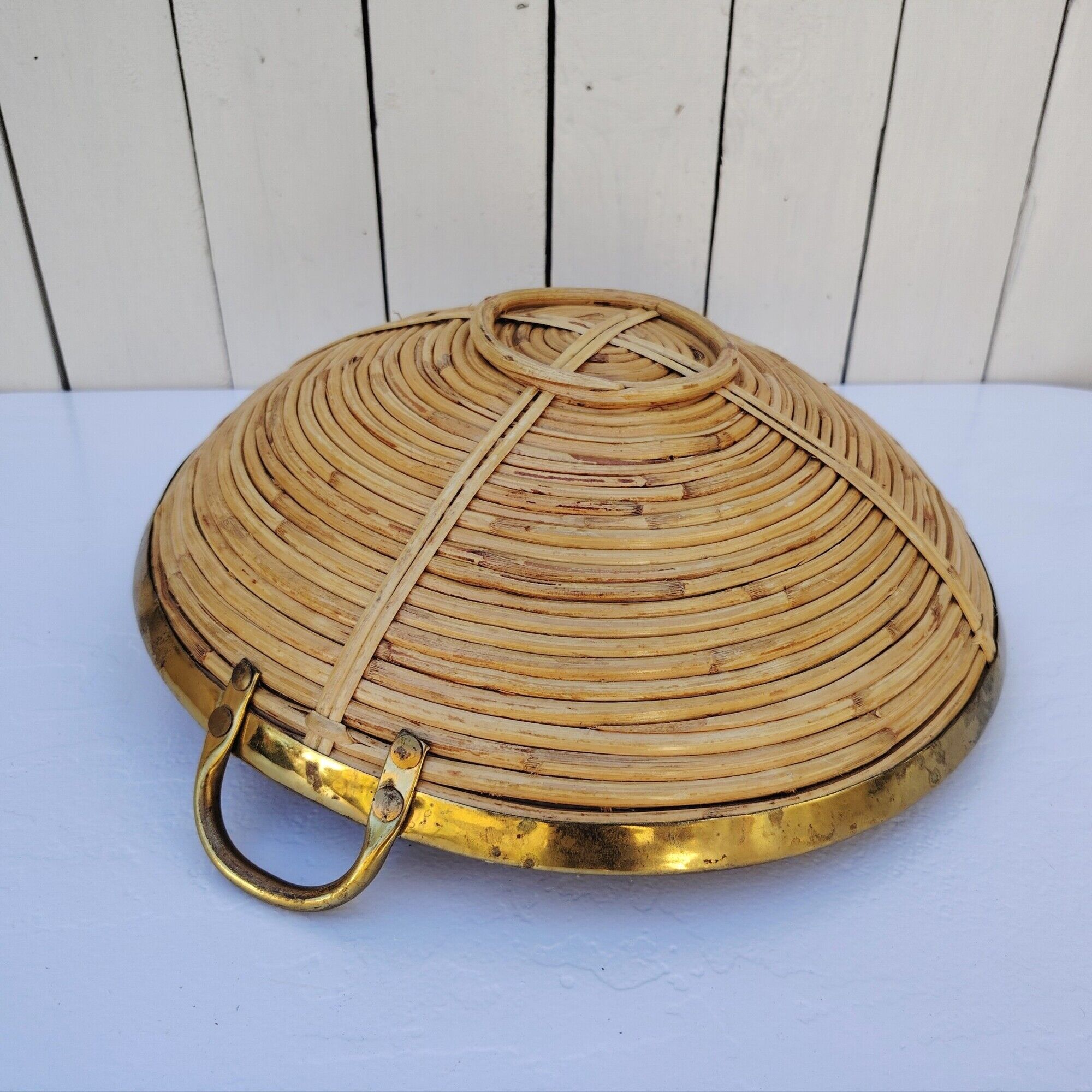 Rattan and brass basket in the style of Gabriella Crespi.
