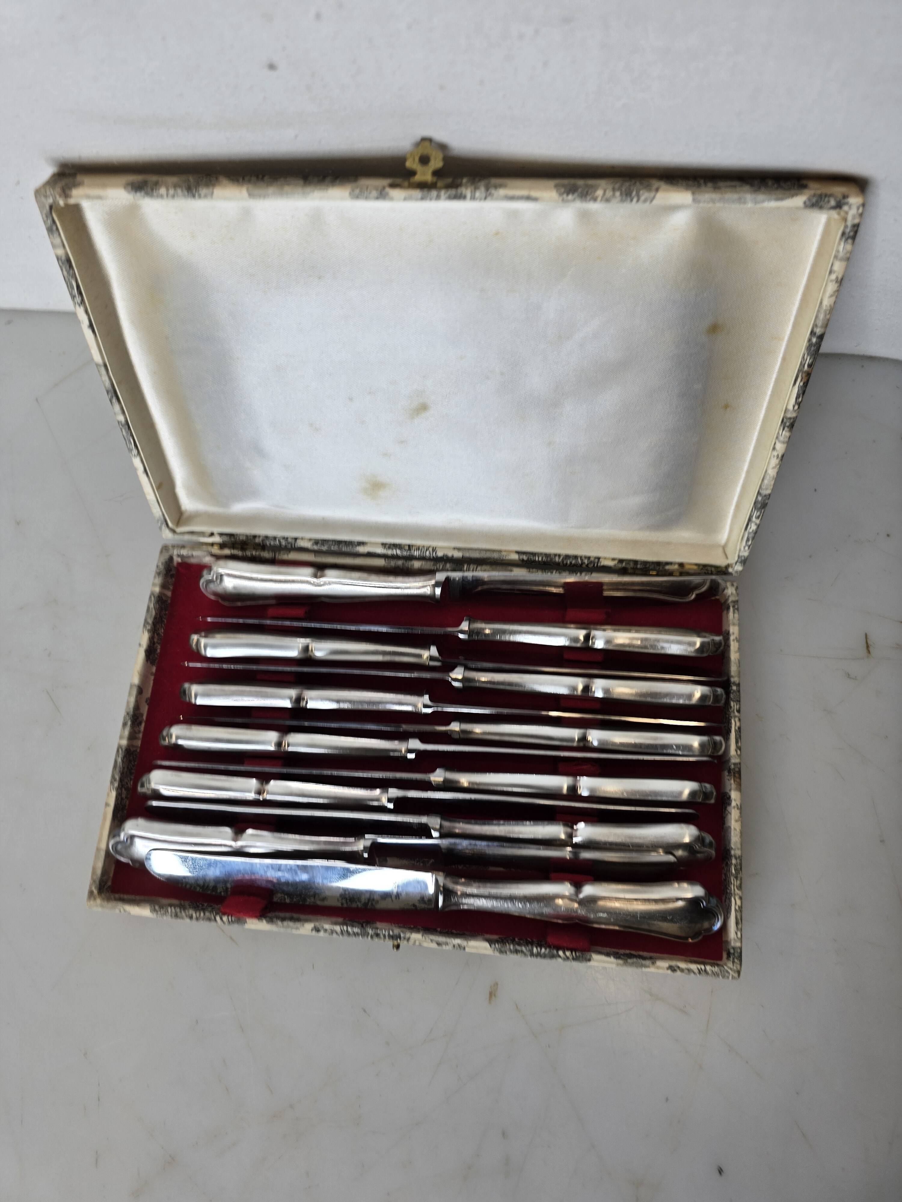 12 silver-plated knives mid-15th century