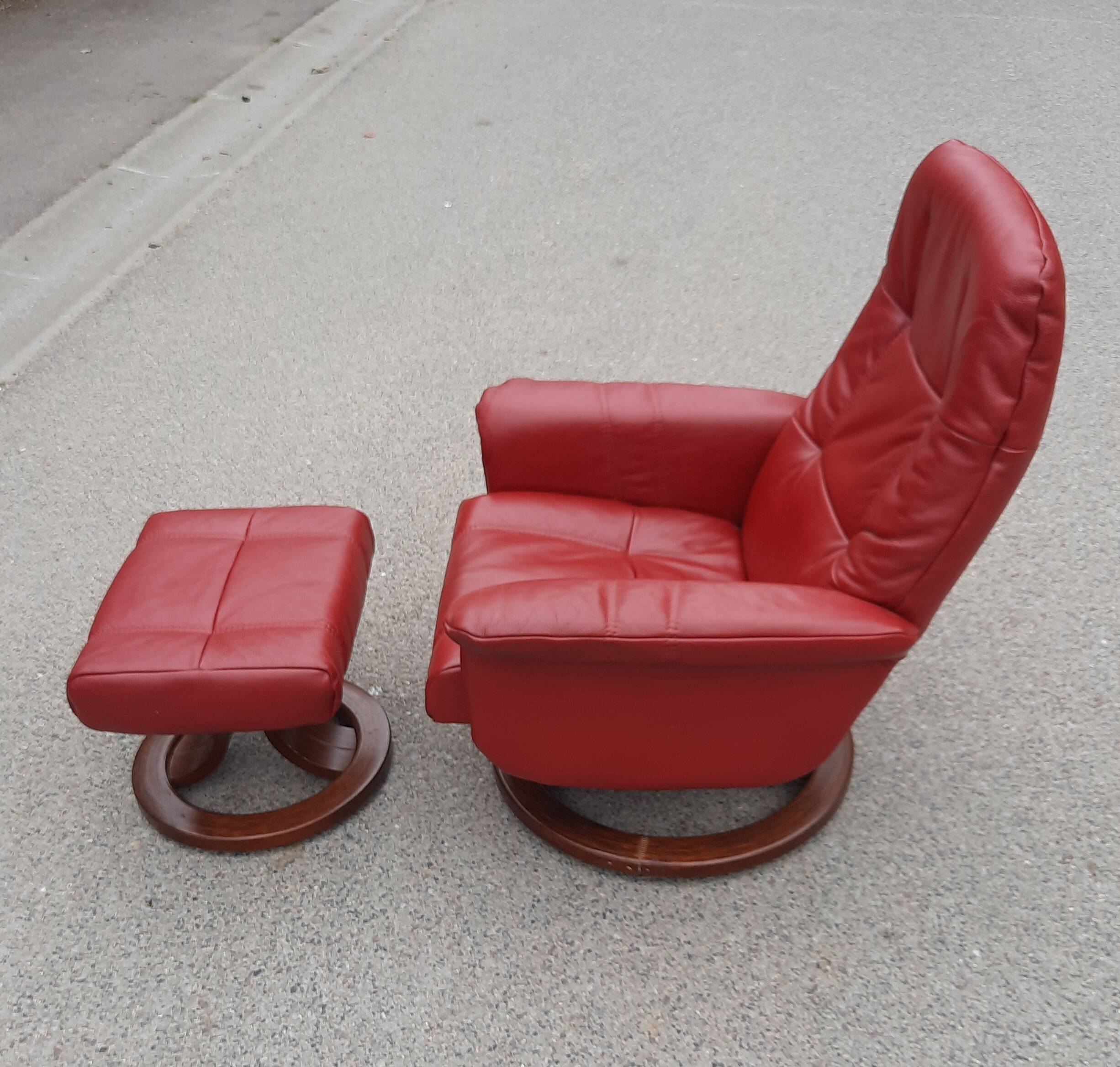Red leather relax armchair and pouf