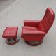 Red leather relax armchair and pouf