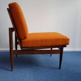 vintage orange armchairs