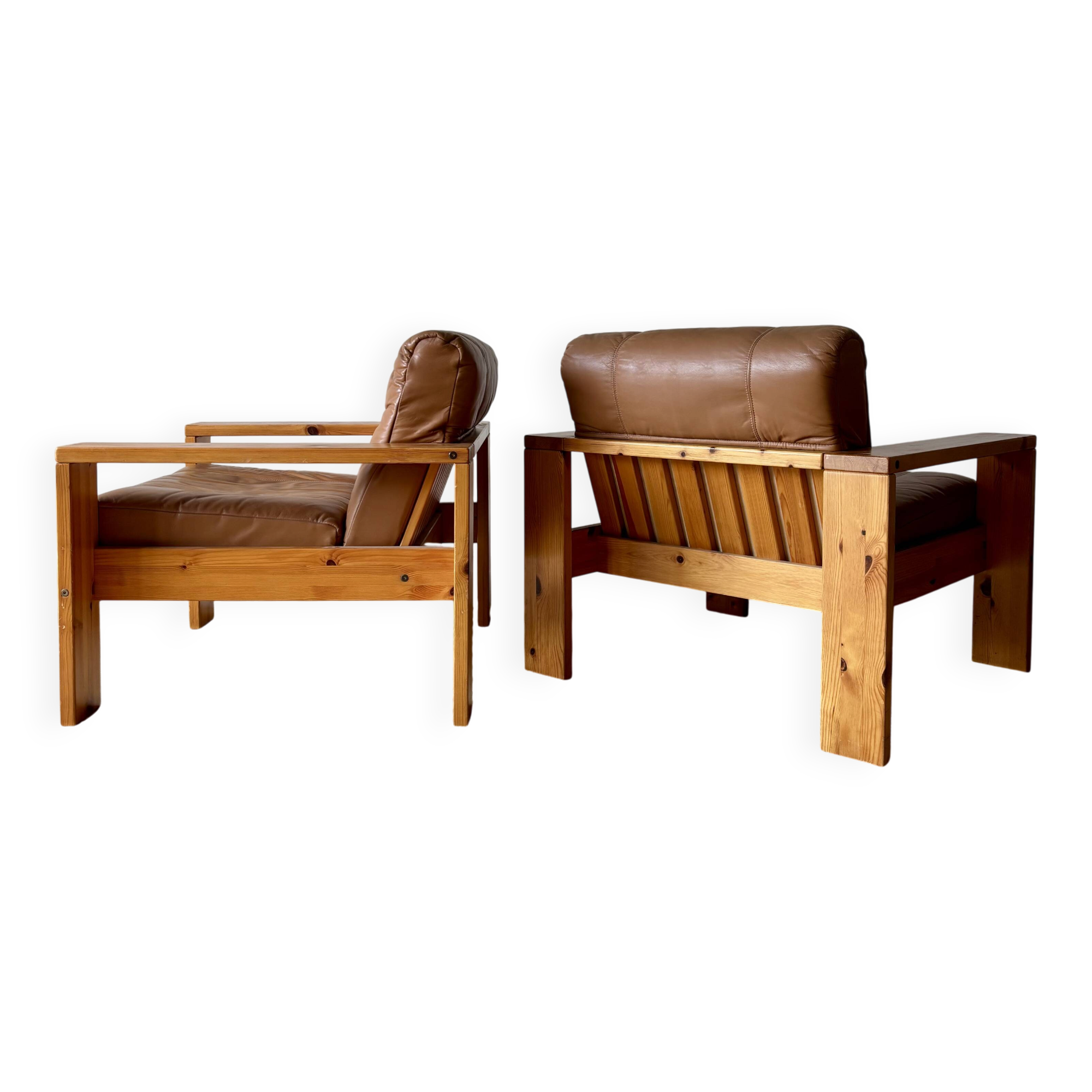 2 pine and leather armchairs from the 1970s