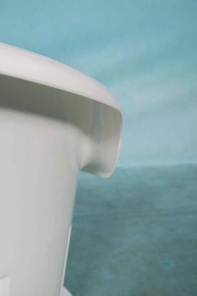 Space-age shell chair with storage, Ikea Popptorp chair.