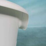 Space-age shell chair with storage, Ikea Popptorp chair.