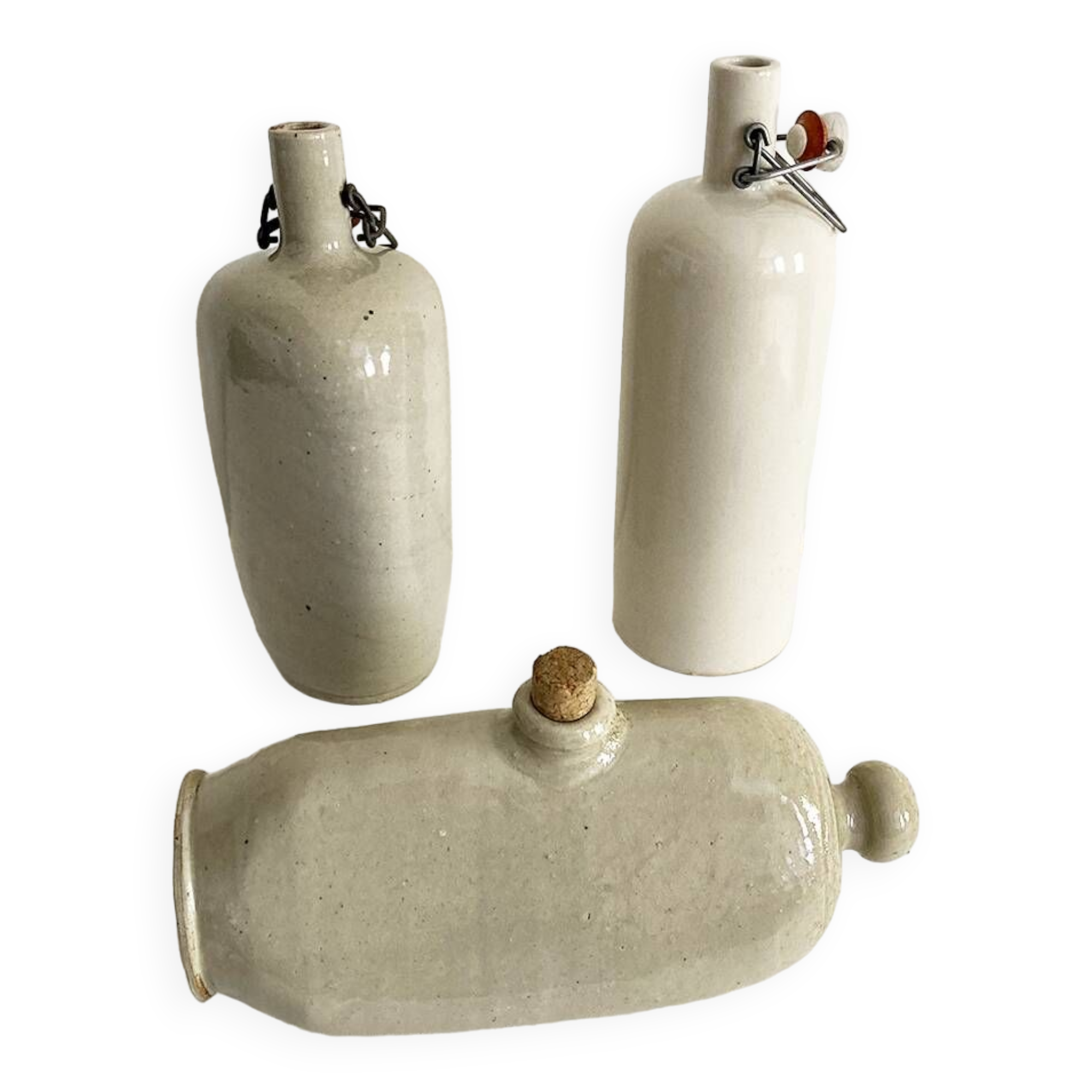 Trio of stoneware hot water bottles, three models