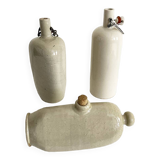 Trio of stoneware hot water bottles, three models