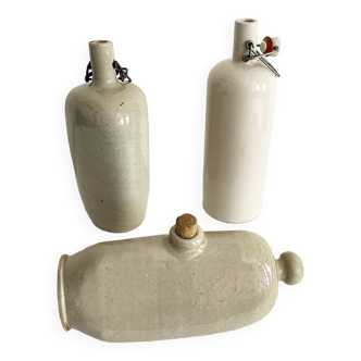 Trio of stoneware hot water bottles, three models
