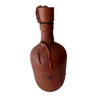 Leather covered bottle with stopper
