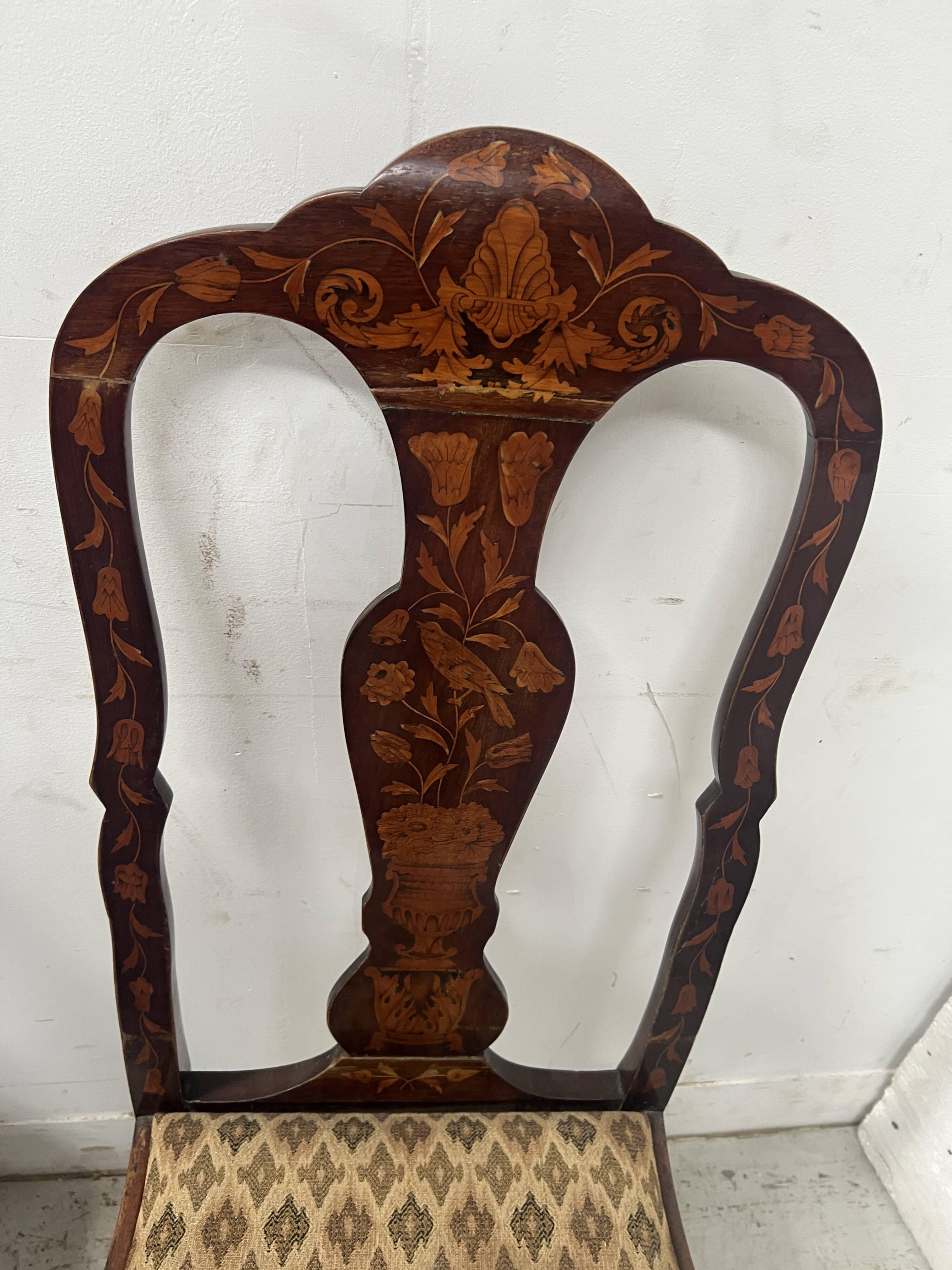 Set of eight Dutch marquetry chairs from the 19th century.