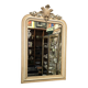 Miroir à fronton sculpté, stuc et bois peint de style Napoléon III - début