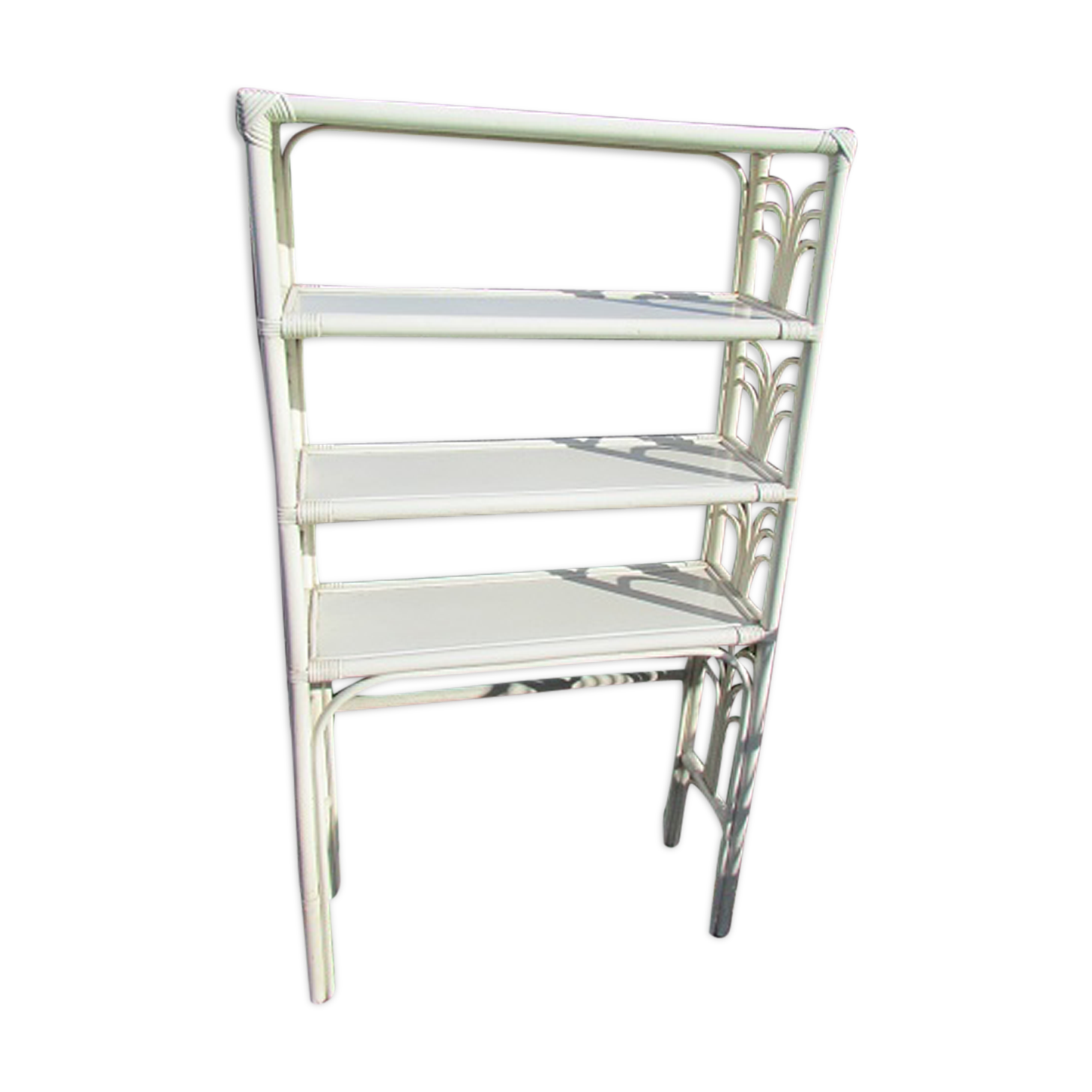 White wicker and rattan shelf