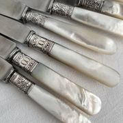 Antique table knives in mother-of-pearl and silver-plated metal