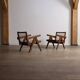 Chaises longues Pierre Jeanneret PJ-SI-29-A en teck et en rotin, années 1950.