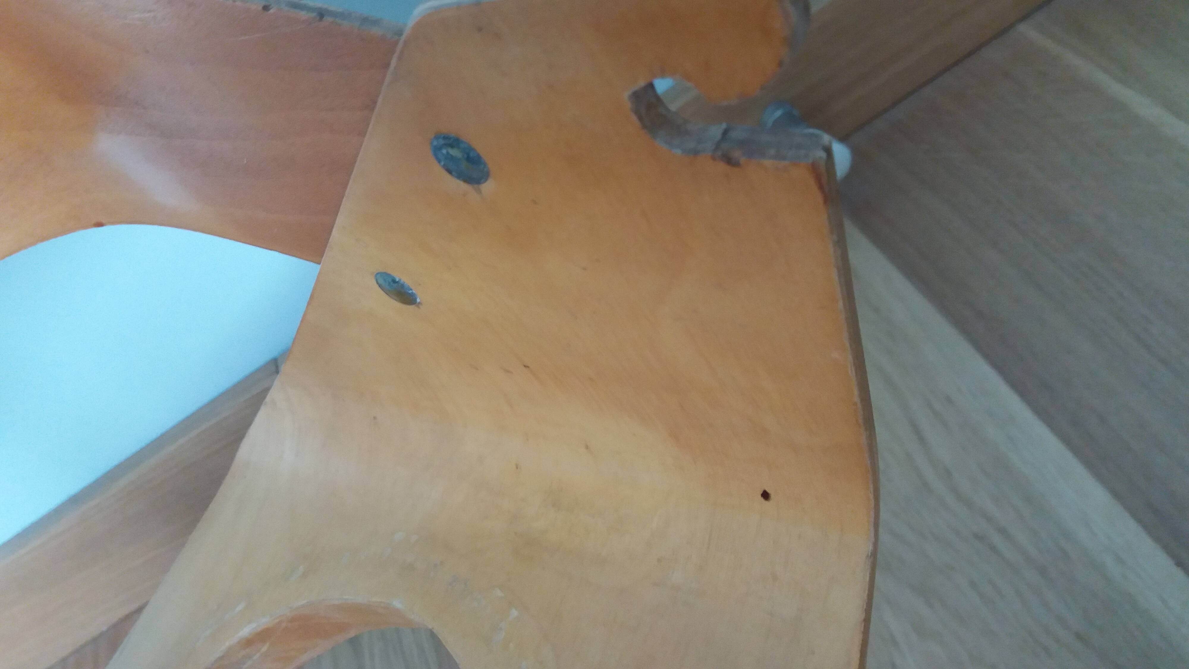 Baumann Baby Coquille children's armchair in bent wood with splayed legs.