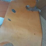 Baumann Baby Coquille children's armchair in bent wood with splayed legs.