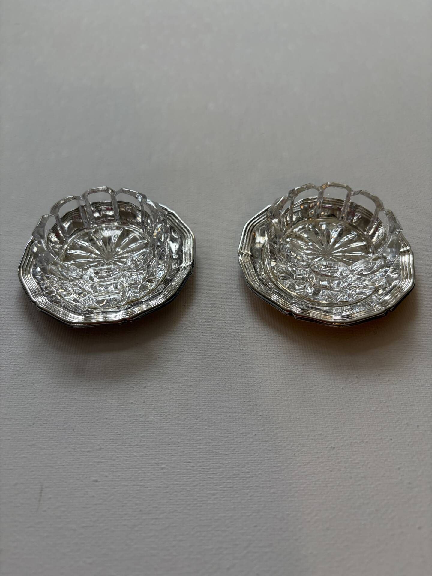 Crystal and silver-plated salt and pepper shakers