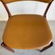 Ensemble de chaises vintage en skaï et palissandre