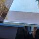 Coffee table from the 70s in chromed steel and smoked plexiglass double swivel trays