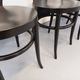 Set of 4 vintage Mouette chairs by Baumann in black wood from the 1960s.
