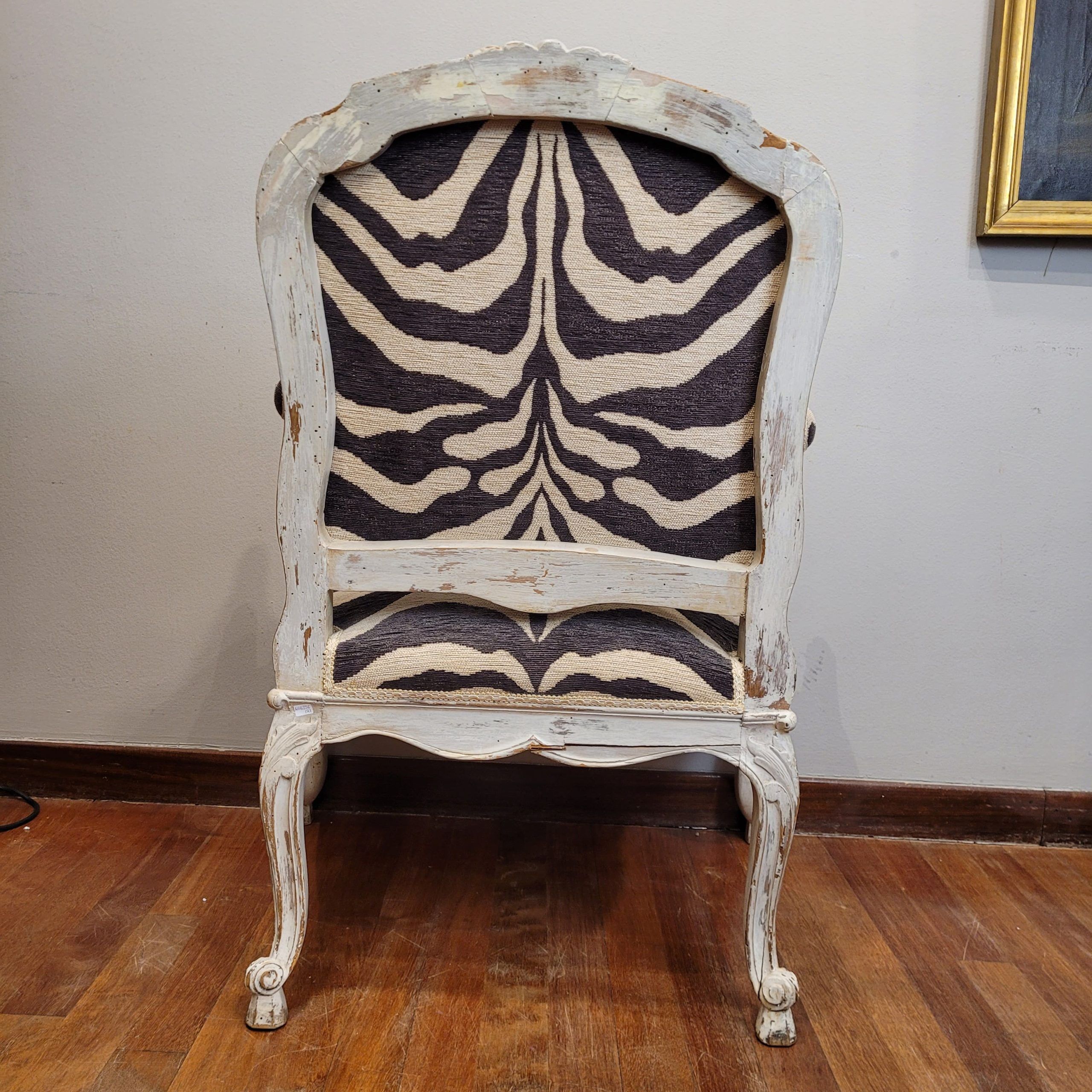Pair of armchairs, carved and polychrome wood, printed zebra tapestry, Louis XV, circa 1790 – France